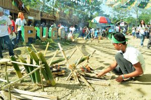 INDIGENOUS COOKING. A young resident of Pugo, La Union participates in the 1st Tinungbo Cookfest last January 21, 2017. The local government is pushing for the revival of this indigenous cooking practices with the use of bamboo stalks through the first-ever “Tinungbo Festival”. (January 29, 2017) Photo by JOSEPH B. MANZANO.