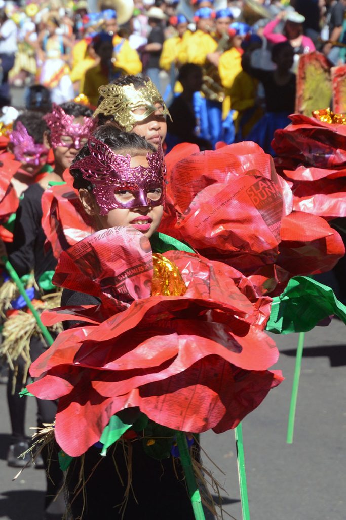 A student from Santa Maria, Bulacan with recycled newspapers as props joined the 22nd edition of the Baguio Flower Festival or the Panagbenga 2017 Grand Street Dancing in Baguio City during the weekend. RMC PIA-CAR